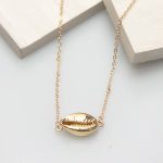 COLGANTE COWRIE ORO